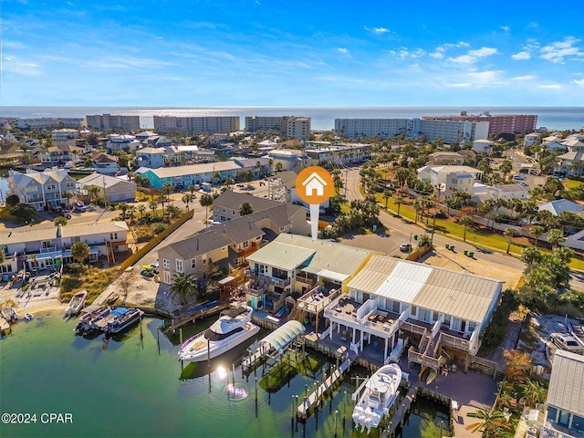 drone / aerial view with a water view