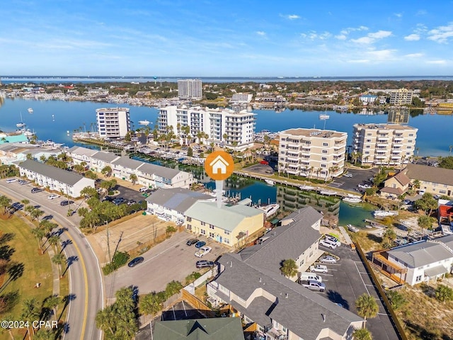 drone / aerial view with a water view