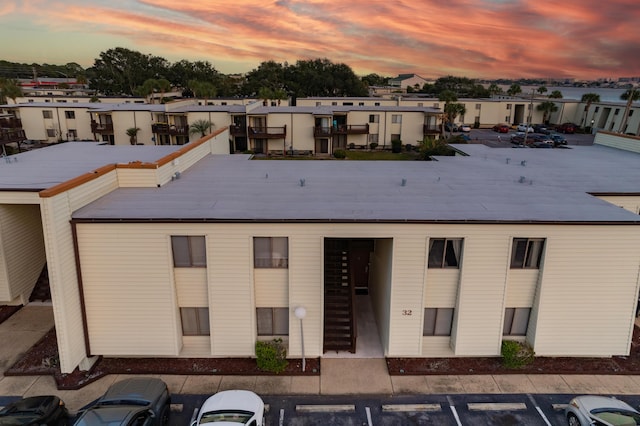 view of outdoor building at dusk