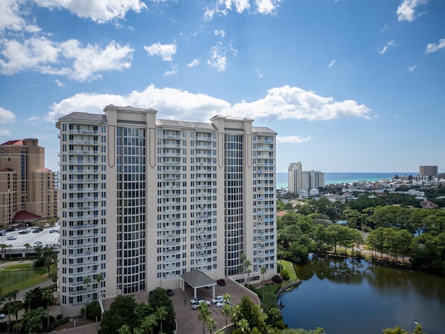 view of building exterior with a water view