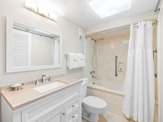 full bathroom with vanity, tile patterned flooring, toilet, shower / bath combo with shower curtain, and a textured ceiling