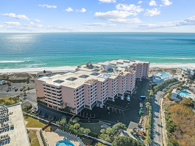 aerial view featuring a water view and a beach view