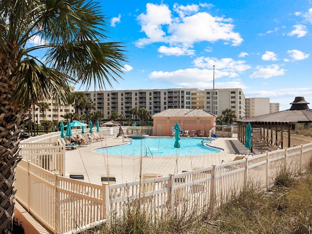 view of pool featuring a patio