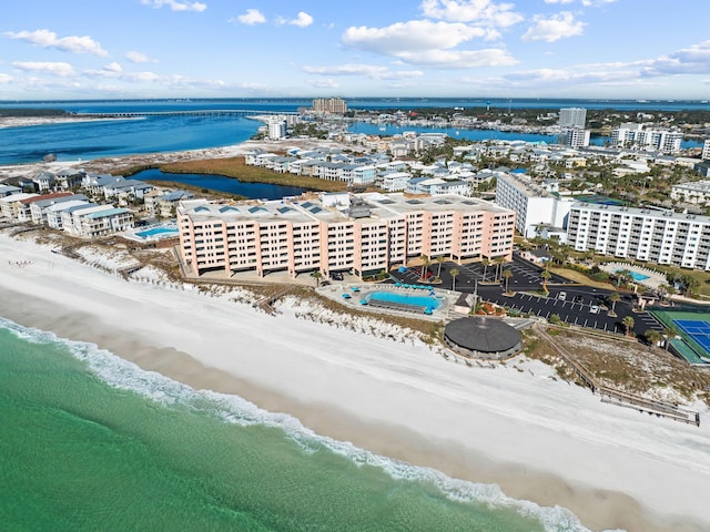 birds eye view of property featuring a water view and a view of the beach