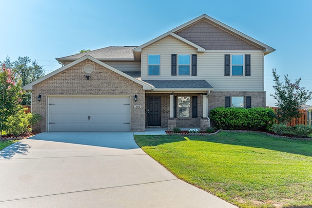 view of front of property with a garage and a front lawn