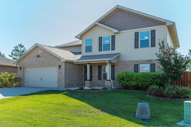 view of front of home with a garage and a front yard