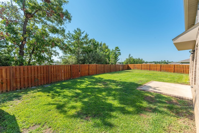 view of yard with a patio area