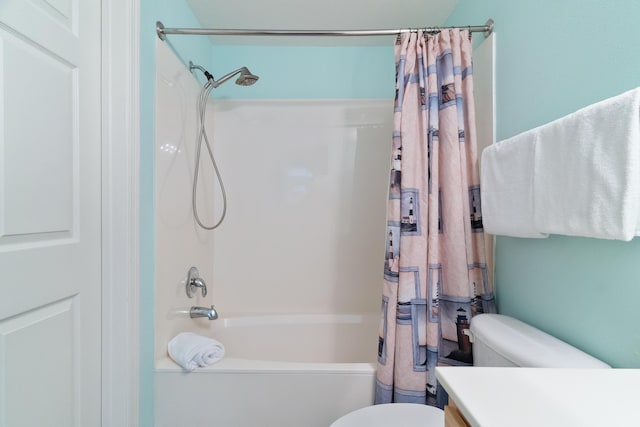 bathroom featuring shower / tub combo with curtain and vanity