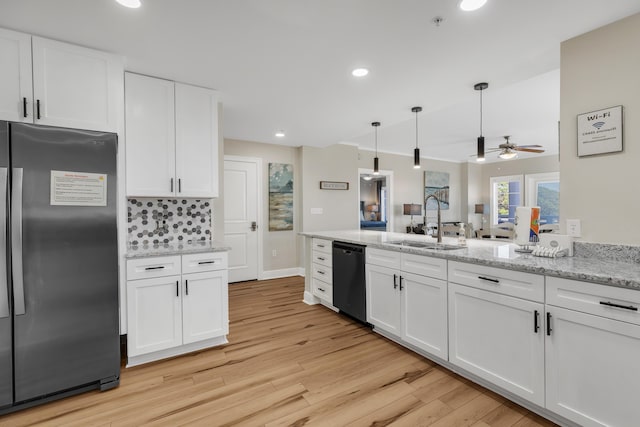 kitchen with decorative backsplash, stainless steel fridge, ceiling fan, dishwasher, and white cabinetry