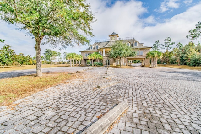 view of front of home featuring a carport