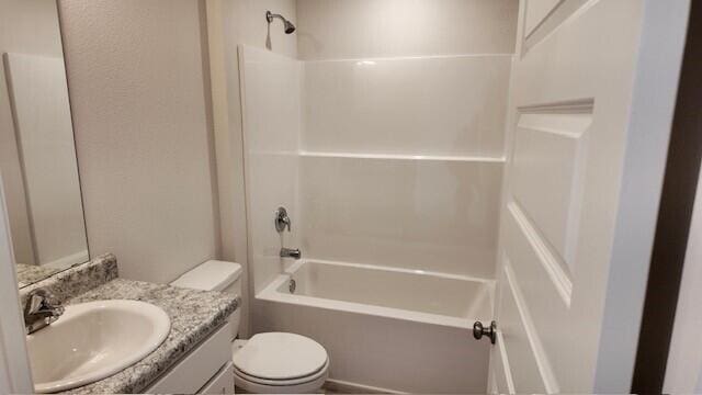 full bathroom with vanity, toilet, and shower / bathtub combination