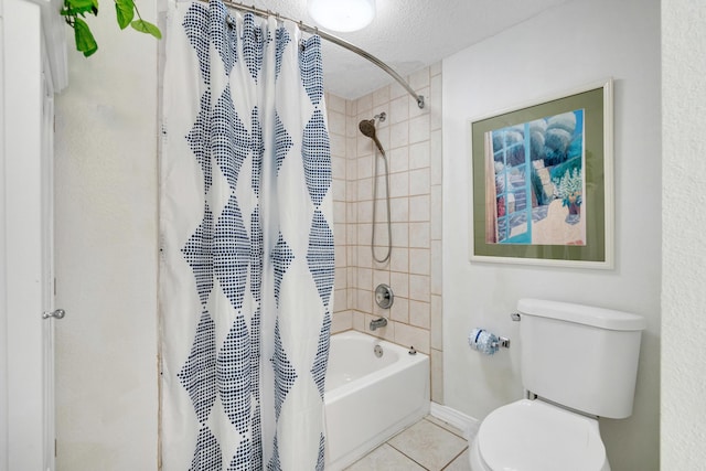 bathroom featuring toilet, shower / bath combination with curtain, a textured ceiling, and tile patterned floors