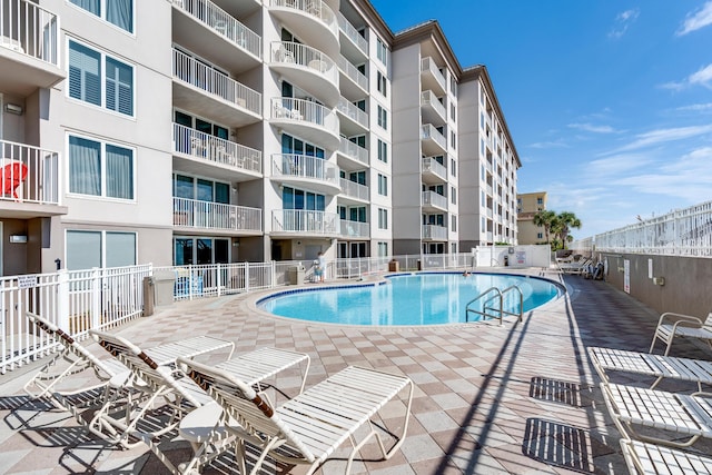 view of swimming pool featuring a patio