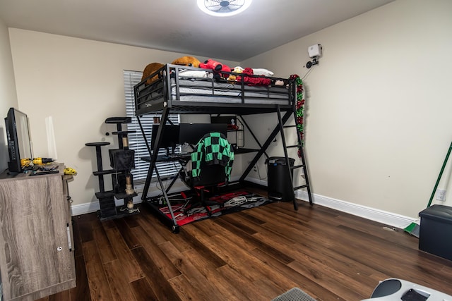 bedroom featuring dark wood-type flooring