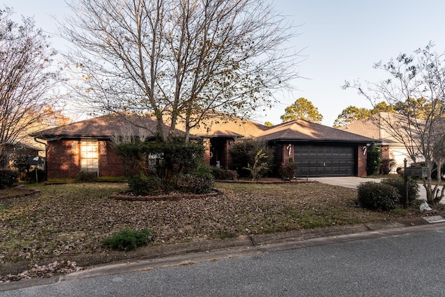 ranch-style house with a garage