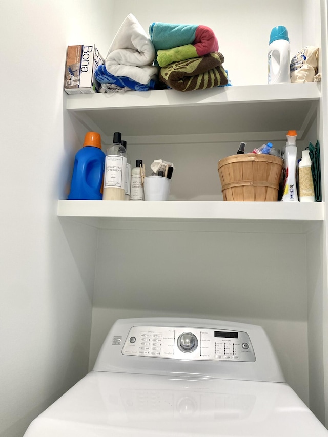 laundry area with washer / dryer