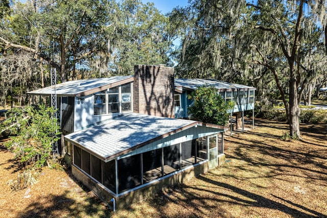 exterior space with a sunroom