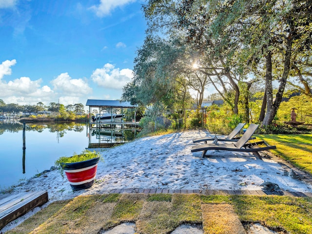 view of dock with a water view