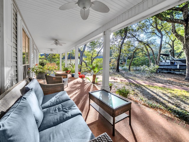 view of patio featuring an outdoor living space and ceiling fan