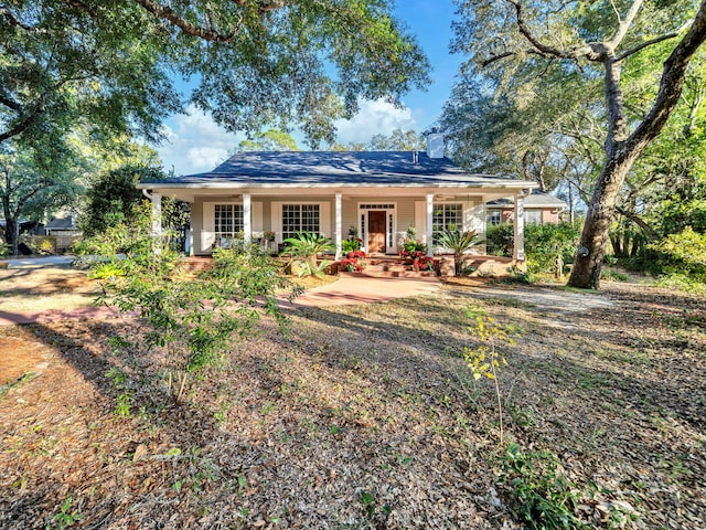 view of front of home featuring covered porch