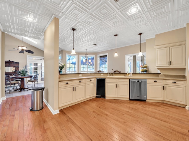 kitchen with light wood-type flooring, stainless steel dishwasher, hanging light fixtures, and ceiling fan