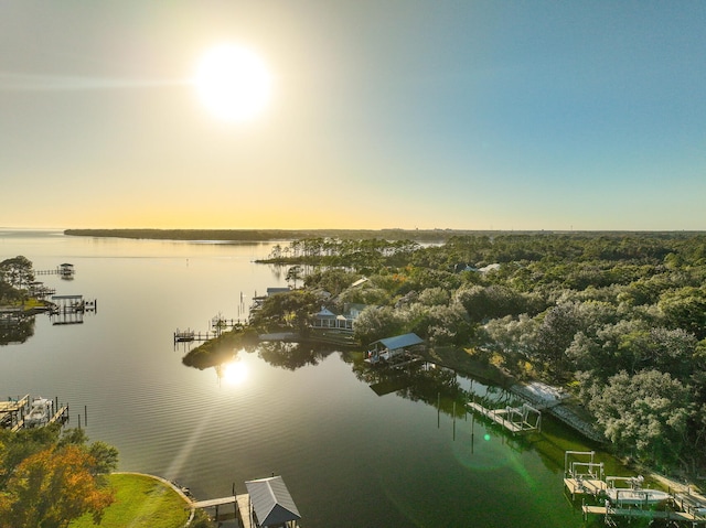 aerial view at dusk with a water view