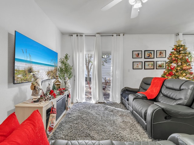 living room featuring ceiling fan