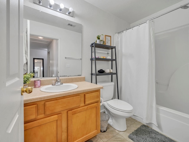 full bathroom with tile patterned flooring, vanity, shower / tub combo, and toilet