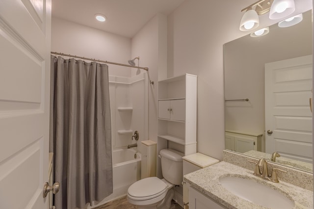 full bathroom with shower / bathtub combination with curtain, vanity, and toilet