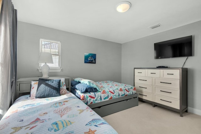 7646 Gulf Blvd, Navarre, FL 32566 - bedroom with light carpet and baseboards