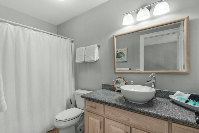 7646 Gulf Blvd, Navarre, FL 32566 - full bathroom with vanity and a shower with curtain