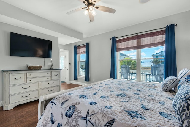 bedroom featuring access to exterior, ceiling fan, and dark hardwood / wood-style flooring