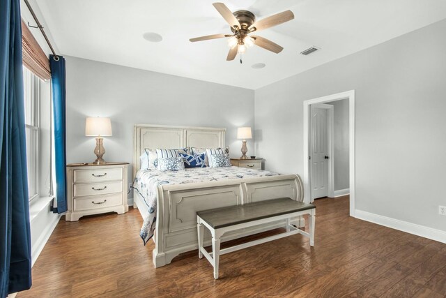 bedroom featuring dark hardwood / wood-style floors and ceiling fan