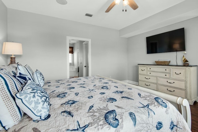 7646 Gulf Blvd, Navarre, FL 32566 - bedroom featuring wood finished floors, ceiling fan, and ensuite bath