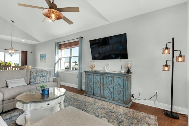 7646 Gulf Blvd, Navarre, FL 32566 - living room with lofted ceiling, wood finished floors, healthy amount of natural light, and ceiling fan