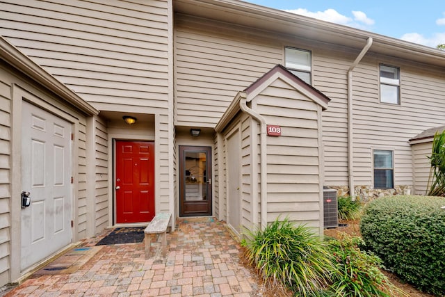 entrance to property with central AC unit