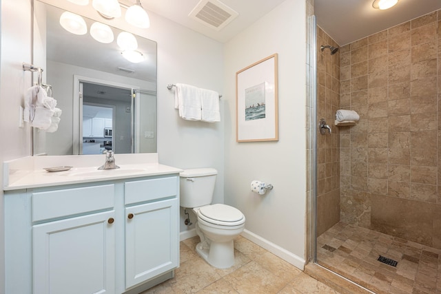 bathroom featuring an enclosed shower, vanity, toilet, and tile patterned flooring