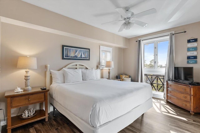 bedroom with ceiling fan, access to exterior, and dark hardwood / wood-style flooring