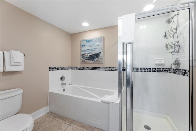 bathroom featuring tile patterned flooring, independent shower and bath, and toilet