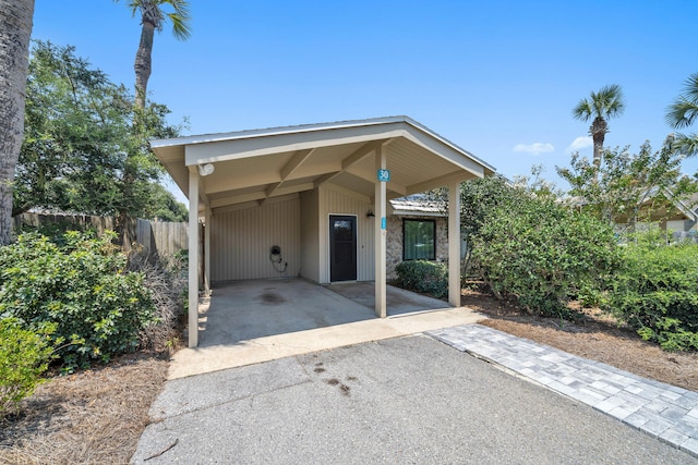 view of front of home with a carport