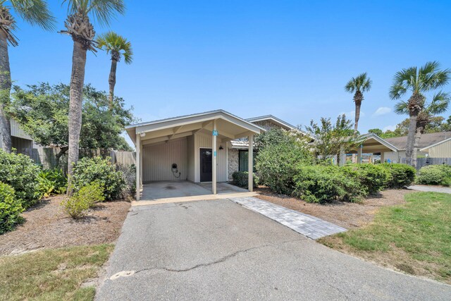 view of front facade with a carport