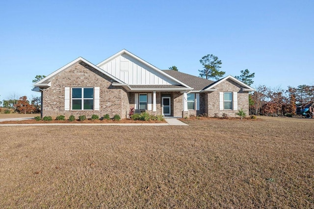 craftsman inspired home with a front yard