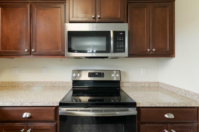 kitchen with appliances with stainless steel finishes