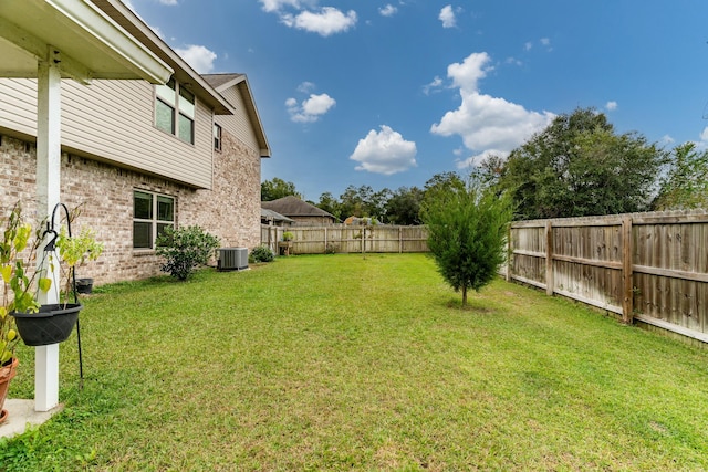 view of yard featuring central AC unit