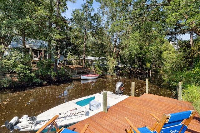 view of dock with a water view