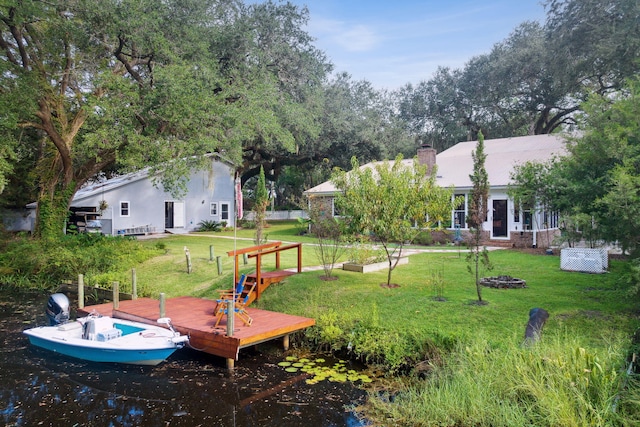 dock area with a yard