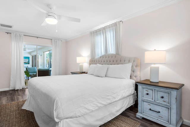 bedroom with ceiling fan, crown molding, and dark wood-type flooring