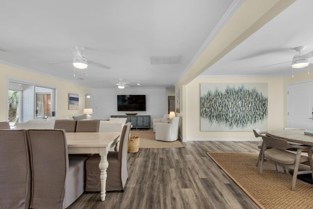 dining room featuring hardwood / wood-style flooring and crown molding