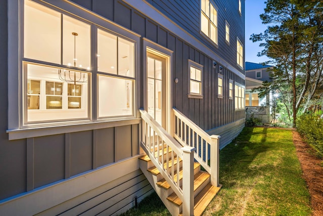 view of home's exterior with a lawn