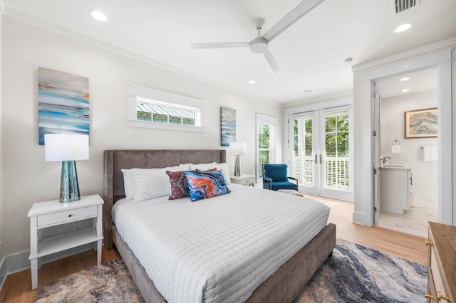 bedroom featuring hardwood / wood-style floors, access to outside, french doors, crown molding, and ceiling fan